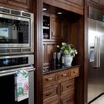 we created a "bar" area tucked in between the double wall ovens and the refridgerator.