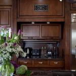 storage garage opens to reveal storage items that simply slide across the countertop into the hidden garage. 